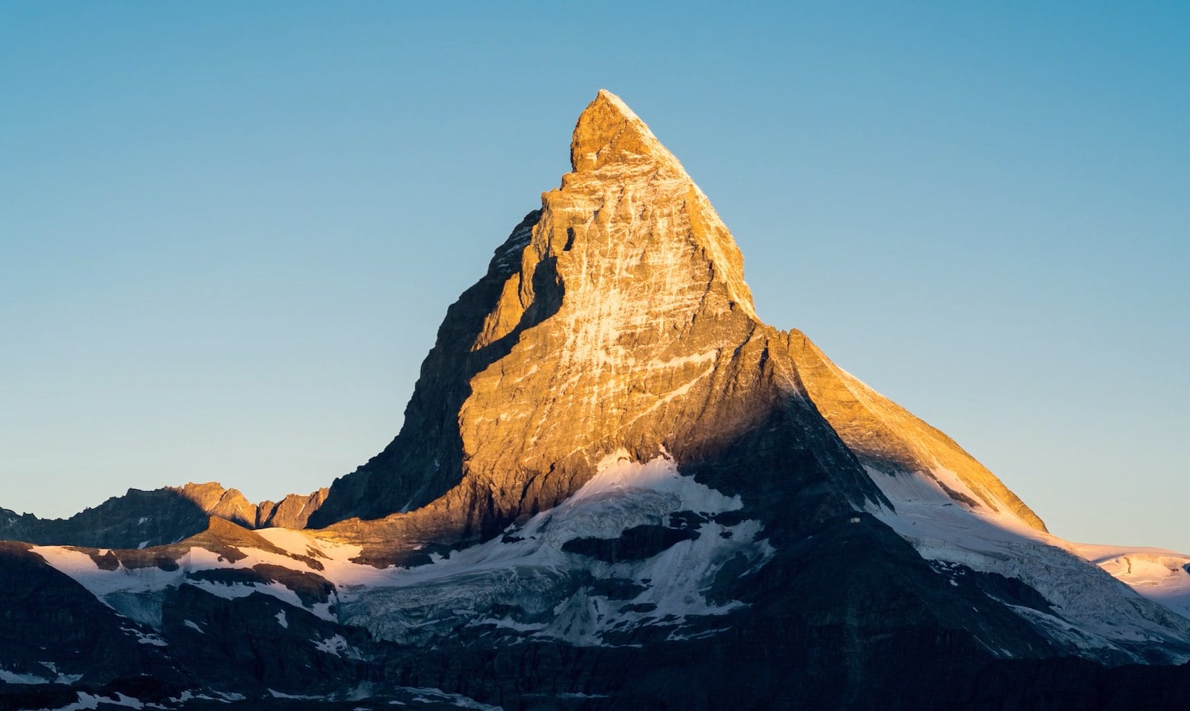 The sun rising over the Matterhorn peak