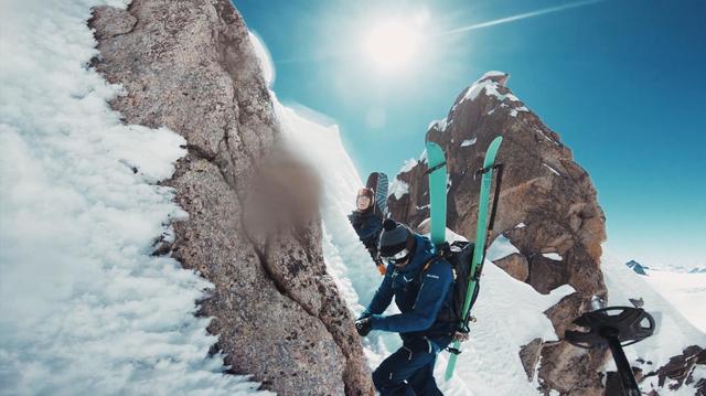 Extreme skiers climbing on the peak of Mont Blanc