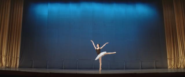 A Russian ballet female dancer in a jump