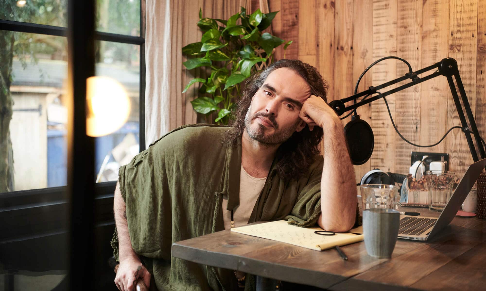 Russell Brand in his home studio